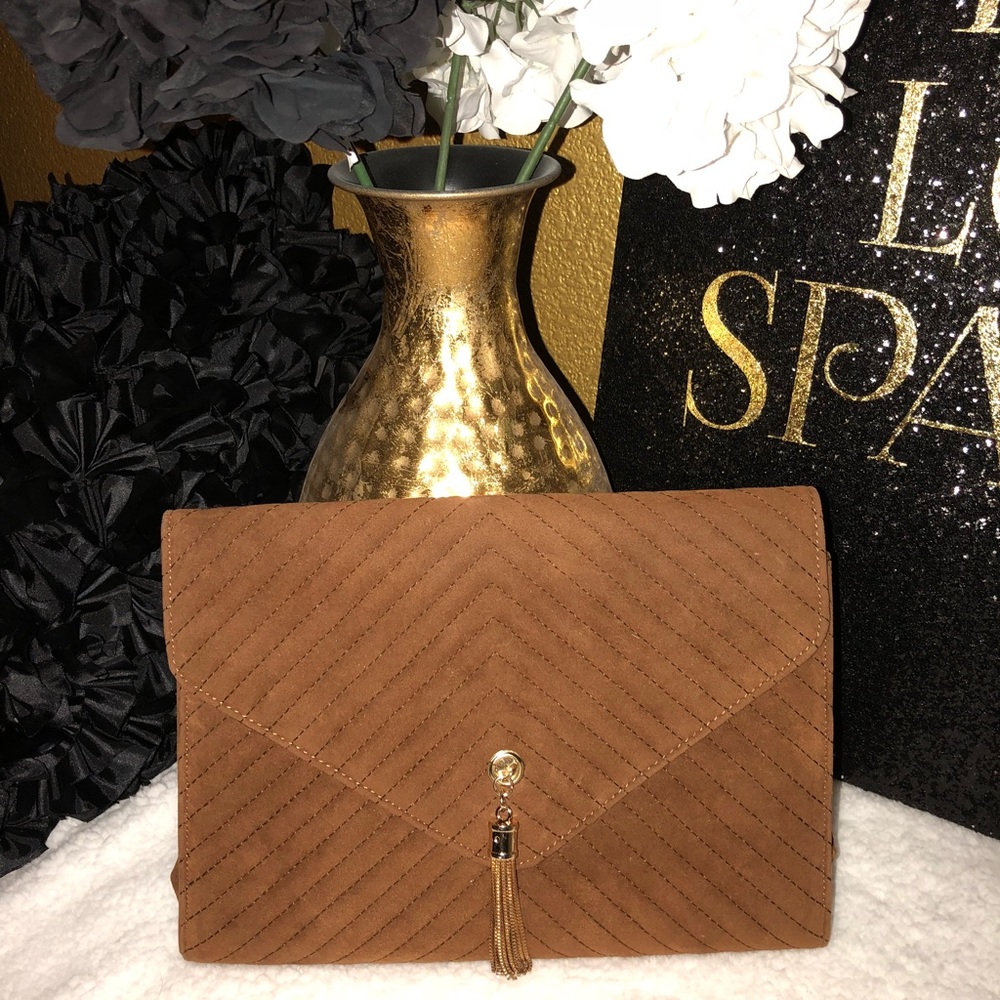 *Tan oversized clutch*